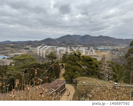 Panoramic view of Korean bonsai garden overlooking Winter Valley Panoramic view of Korean bonsai garden overlooking Winter Valley 140897592