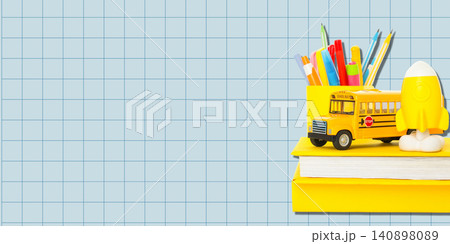 Back to school, Colorful stationery and a toy school bus are neatly displayed for new academic year Back to school, Colorful stationery and a toy school bus are neatly displayed for new academic year 140898089
