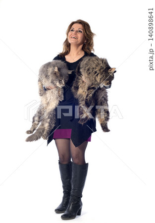 woman and cats in studio woman and cats in studio 140898641