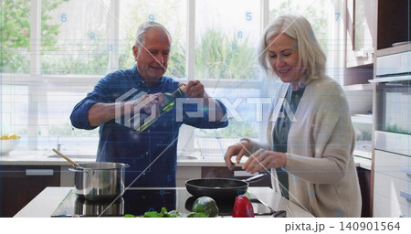 Pouring senior man, woman cracking egg at home kitchen island, green bottle, frying pan, overlay 140901564