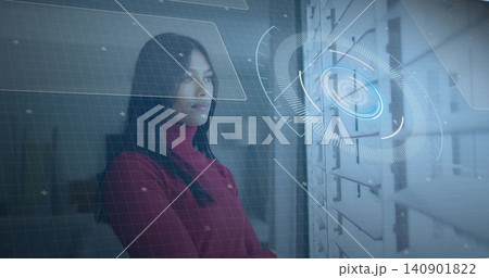 Woman red turtleneck studying holo HUD in lab with glass panel and server racks, copy space Woman red turtleneck studying holo HUD in lab with glass panel and server racks, copy space 140901822