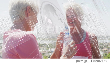 Supporting senior in pink top, runner in red tank holding water bottle on hill, HUD overlays Supporting senior in pink top, runner in red tank holding water bottle on hill, HUD overlays 140902149