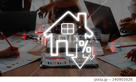 A team collaborates on real estate trends using financial graphs and charts, featuring a prominent house icon with downward arrows to signify market challenges. Sigmoid 140903026