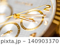 golden watch close up dial and hands 140903370