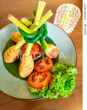 Grilled mini chicken fillets with spicy sambal are a traditional dish from Bali, Indonesia. 140903497