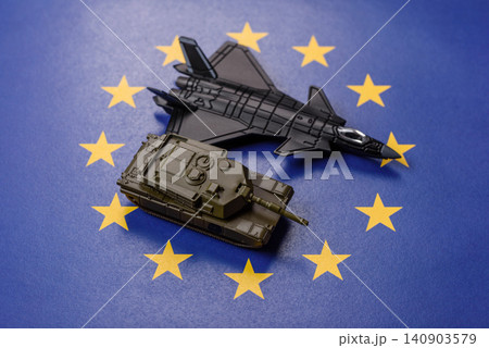 A fighter jet on the European Union flag as a conceptual backdrop representing Europe's defense 140903579