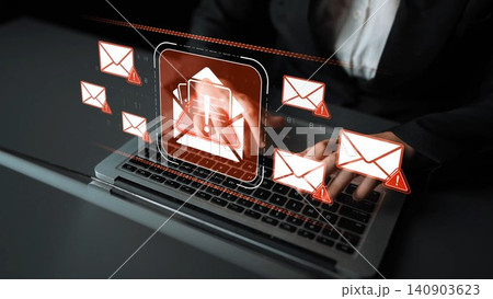 A professional interaction with digital email icons displayed above a laptop in an office setting illustrates modern digital communication and technological connectivity. Sigmoid 140903623
