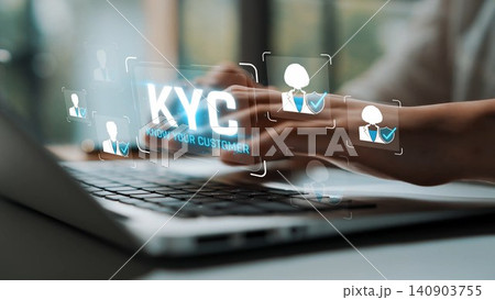 A close-up view of hands typing on a laptop, showcasing a digital KYC process that highlights customer identification for financial services and compliance management. Sigmoid A close-up view of hands typing on a laptop, showcasing a digital KYC process that highlights customer identification for financial services and compliance management. Sigmoid 140903755