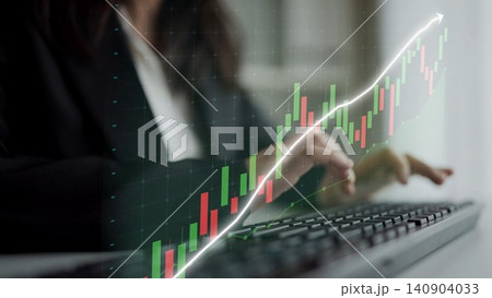 Professional businesswoman analyzing financial data on computer with stock market growth chart overlay representing successful investment strategies and trends Copula 140904033