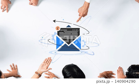 A business team collaborates on email marketing strategies illustrated by hands pointing at graphics on a white desk, emphasizing teamwork and innovative ideas. Entropy A business team collaborates on email marketing strategies illustrated by hands pointing at graphics on a white desk, emphasizing teamwork and innovative ideas. Entropy 140904290