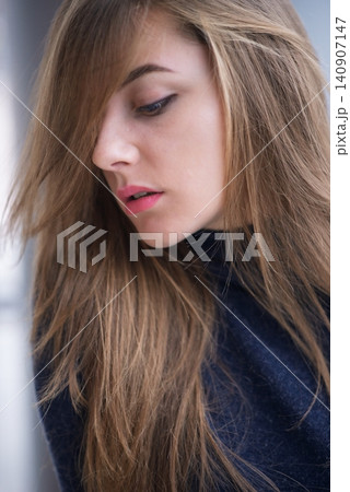 Portrait close up of glamour woman with long hair Portrait close up of glamour woman with long hair 140907147