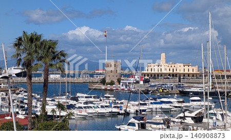 Marina view with old port control tower and Spanish flag Marina view with old port control tower and Spanish flag 140908873