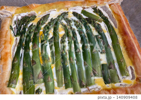 Fresh Green Asparagus Tart with Creamy Cheese and Flaky Puff Pastry 140909408