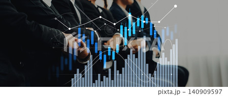 Business professionals in a meeting with financial charts and graphs representing growth, strategy, and market analysis in a modern office setting Scalp 140909597