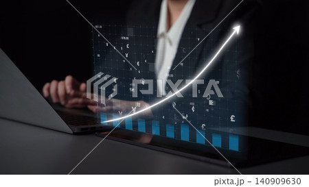 Business professional analyzing data trends with digital financial graphics on laptop screen in modern office environment for growth strategy planning Copula Business professional analyzing data trends with digital financial graphics on laptop screen in modern office environment for growth strategy planning Copula 140909630