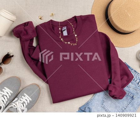 Blank dark red unisex sweatshirt mockup, folded crewneck flat lay with copy space on front Blank dark red unisex sweatshirt mockup, folded crewneck flat lay with copy space on front 140909921