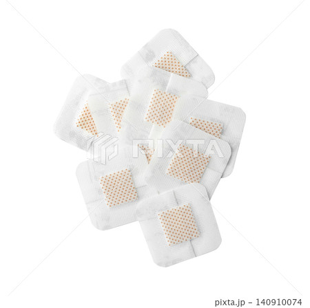 Medical sticking plasters isolated on white. First aid item 140910074
