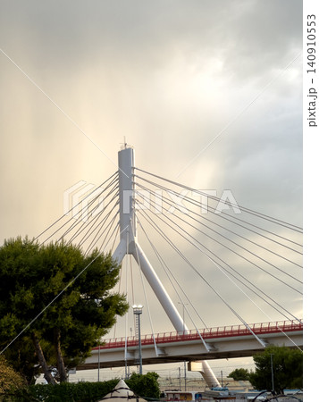 White cable-stayed bridge and stormy sky in Bari, Southern Italy White cable-stayed bridge and stormy sky in Bari, Southern Italy 140910553