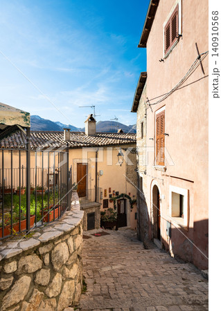 Barrea medieval street and old stone houses under a bright blue sky Barrea medieval street and old stone houses under a bright blue sky 140910568