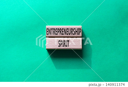 Entrepreneurship spirit symbol. Concept word Entrepreneurship spirit on wooden blocks. Beautiful green background. Business and Entrepreneurship spirit concept. Copy space Entrepreneurship spirit symbol. Concept word Entrepreneurship spirit on wooden blocks. Beautiful green background. Business and Entrepreneurship spirit concept. Copy space 140911374