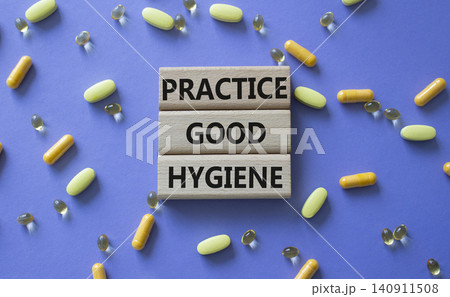 PRACTICE GOOD HYGIENE symbol. Concept words PRACTICE GOOD HYGIENE on wooden blocks. Beautiful purple background with pills. Healthcare and PRACTICE GOOD HYGIENE concept. Copy space. PRACTICE GOOD HYGIENE symbol. Concept words PRACTICE GOOD HYGIENE on wooden blocks. Beautiful purple background with pills. Healthcare and PRACTICE GOOD HYGIENE concept. Copy space. 140911508