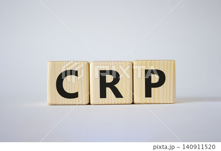 CRP - C-Reactive Protein Test symbol. Wooden cubes with word CRP. Beautiful white background. Medical and C-Reactive Protein Test concept. Copy space. CRP - C-Reactive Protein Test symbol. Wooden cubes with word CRP. Beautiful white background. Medical and C-Reactive Protein Test concept. Copy space. 140911520