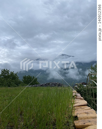 Cloud Covered Mountain Peaks After Rain with Dramatic Landscape Cloud Covered Mountain Peaks After Rain with Dramatic Landscape 140912366