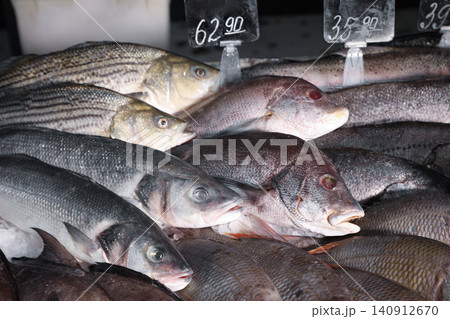 Different types of fresh fish in supermarket, closeup 140912670