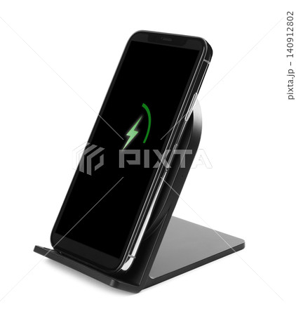 Mobile phone charging with wireless pad isolated on white 140912802