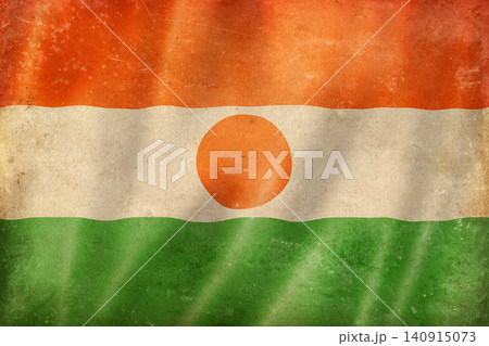 Old vintage flag of Niger, worn and stained Old vintage flag of Niger, worn and stained 140915073