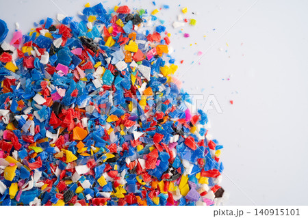 Plastic colorful pieces recycling shredded for industrial use. Plastic colorful pieces recycling shredded for industrial use. 140915101
