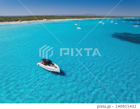 Luxury yacht in crystal clear turquoise sea, aerial drone view Luxury yacht in crystal clear turquoise sea, aerial drone view 140915432