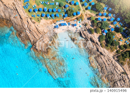 Aerial drone view of sea bay, sandy beach with umbrellas 140915496