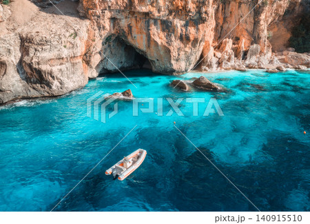 Aerial view of yacht and boats on blue sea at sunny day in summer 140915510