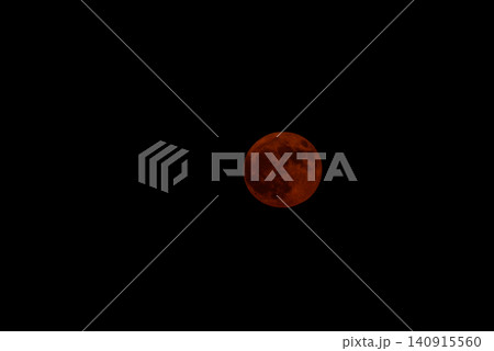 Glowing Orange Full Moon in an Empty Black Sky Glowing Orange Full Moon in an Empty Black Sky 140915560