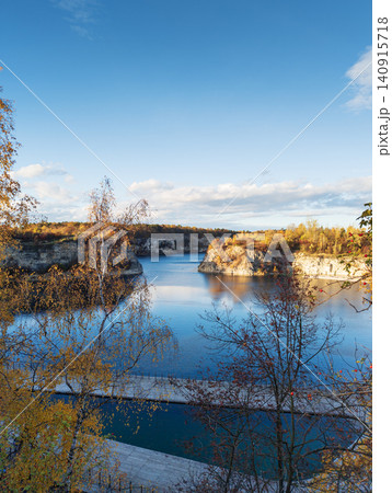 Zakrzowek quarry lake landscape during autumn Zakrzowek quarry lake landscape during autumn 140915718