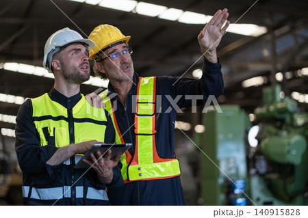 Workers Factory or Engineering work at factory site check up machine or products in site Workers Factory or Engineering work at factory site check up machine or products in site 140915828