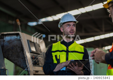 Workers Factory or Engineering work at factory site check up machine or products in site Workers Factory or Engineering work at factory site check up machine or products in site 140915841