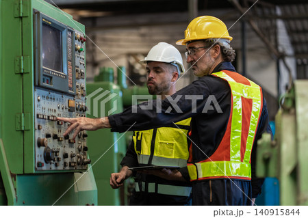 Workers Factory or Engineering work at factory site check up machine or products in site Workers Factory or Engineering work at factory site check up machine or products in site 140915844