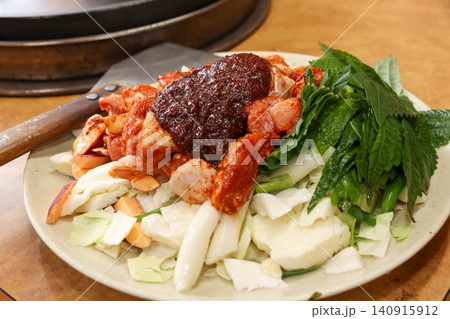 Raw Spicy Korean Chicken Stir Fry Dakgalbi with Vegetables 140915912