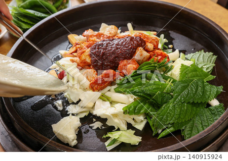 Raw Spicy Korean Chicken Stir Fry Dakgalbi with Vegetables Raw Spicy Korean Chicken Stir Fry Dakgalbi with Vegetables 140915924