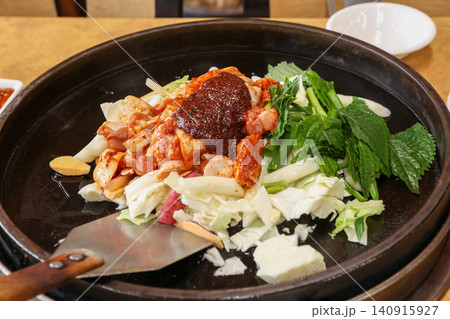 Raw Spicy Korean Chicken Stir Fry Dakgalbi with Vegetables Raw Spicy Korean Chicken Stir Fry Dakgalbi with Vegetables 140915927