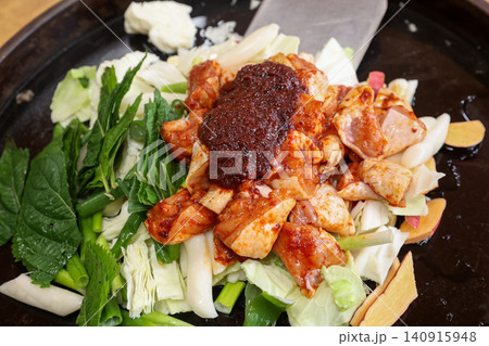 Raw Spicy Korean Chicken Stir Fry Dakgalbi with Vegetables 140915948