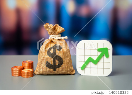 Positive growth chart and dollar money bag. Income and profit growth. Improving the economy, increasing budget revenues. Working capital surplus. Positive growth chart and dollar money bag. Income and profit growth. Improving the economy, increasing budget revenues. Working capital surplus. 140918323