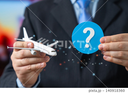 An airplane and a question mark in an official's hand. Frequently asked questions about air travel and booking tickets. Flight information. Forecasts in the aviation industry. An airplane and a question mark in an official's hand. Frequently asked questions about air travel and booking tickets. Flight information. Forecasts in the aviation industry. 140918360