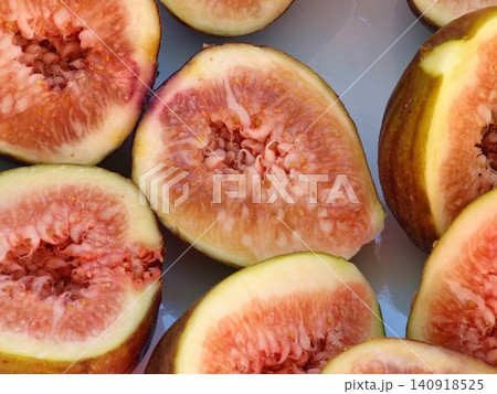 Cut Open Common Figs Showing Red Flesh and Seeds Cut Open Common Figs Showing Red Flesh and Seeds 140918525
