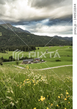 Panoramic view of Allgau Alps with green meadows and alpine village in summer - Sonthofen, Bavaria, Germany Panoramic view of Allgau Alps with green meadows and alpine village in summer - Sonthofen, Bavaria, Germany 140918844