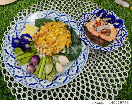 Authentic Thai Corn Omelet served with Shrimp Paste Dip and Fresh Vegetables Authentic Thai Corn Omelet served with Shrimp Paste Dip and Fresh Vegetables 140919748