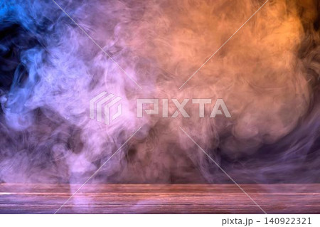 Colorful smoke explosion over water at sunset 140922321