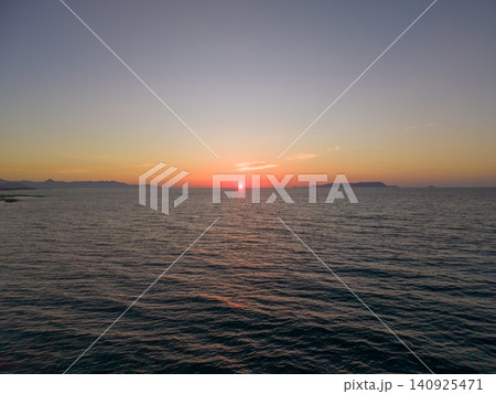 Scenic Aerial View of Sunset Over Mediterranean Sea in Crete Scenic Aerial View of Sunset Over Mediterranean Sea in Crete 140925471